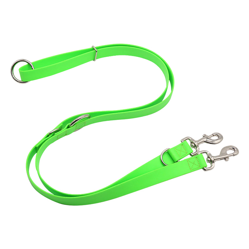 Neon green dog leash with metal clips on a white background